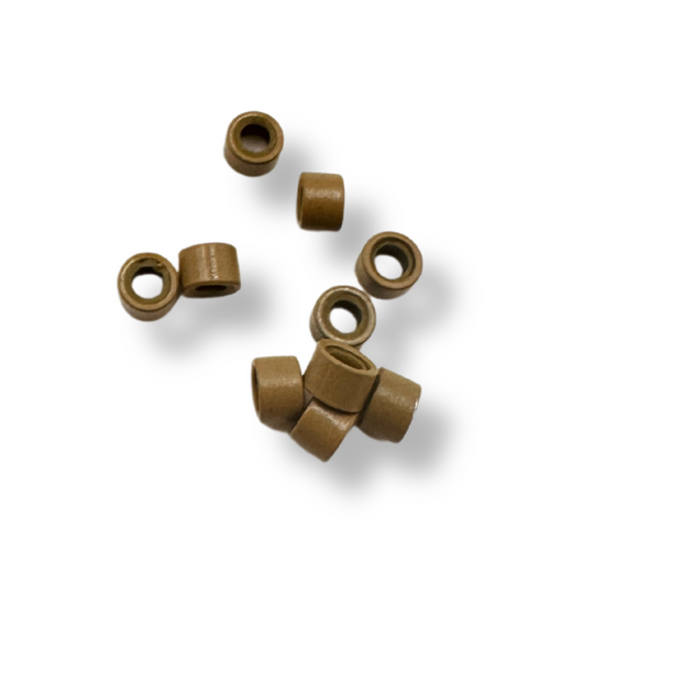 pre-loaded micro beads. Specifically designed for weft and I-tip hair extensions, these beads feature a silicone lining that ensures a secure and comfortable grip without damaging your natural hair. The pre-loaded design allows for a fast and efficient set-up, enabling quicker loading on your looping tool. 