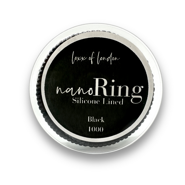 pre-loaded nano rings. Specifically designed for nano tip hair extensions, these beads feature a silicone lining that ensures a secure and comfortable grip without damaging your natural hair. The pre-loaded design allows for a fast and efficient set-up, enabling quicker loading on your looping tool. 