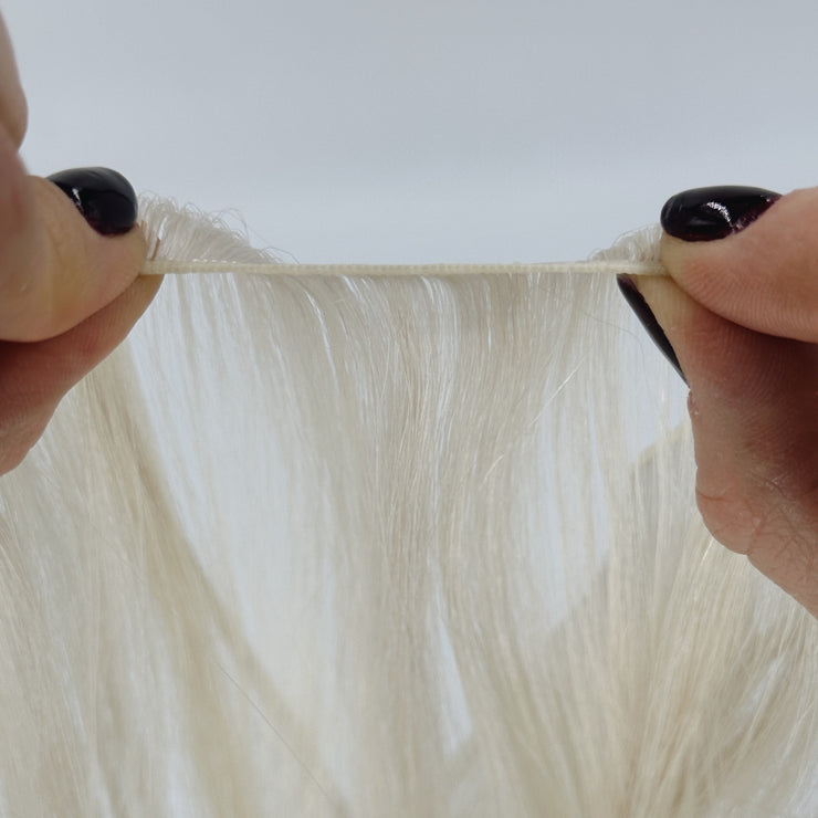 Genius Miracle Micro Wefts - Loxx Of London - Close-up view of Genius Miracle Micro W wefts, the smallest wefts on the market. These delicate wefts ensure a seamless and natural integration with your hair, providing ultimate comfort and durability
