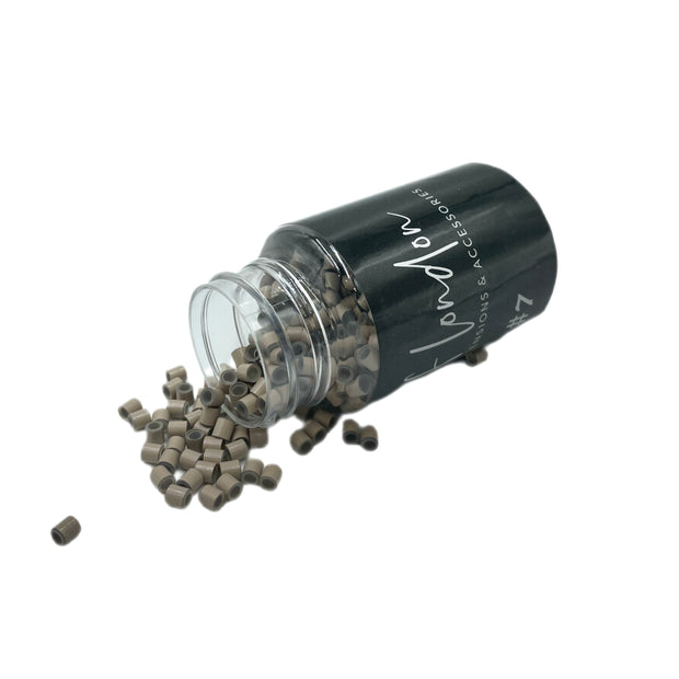 Copper silicone lined micro beads for secure and comfortable micro bead or weft hair extensions.